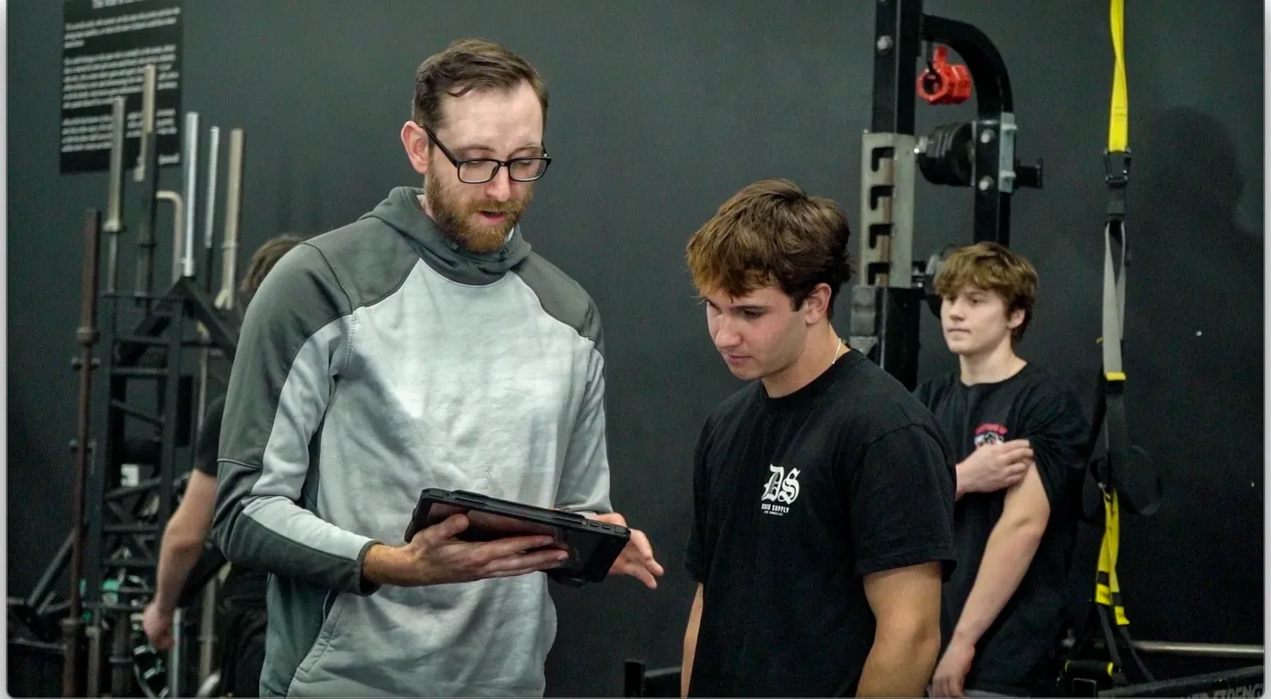 Alex Powers coaching a player at Powerhouse Sports
