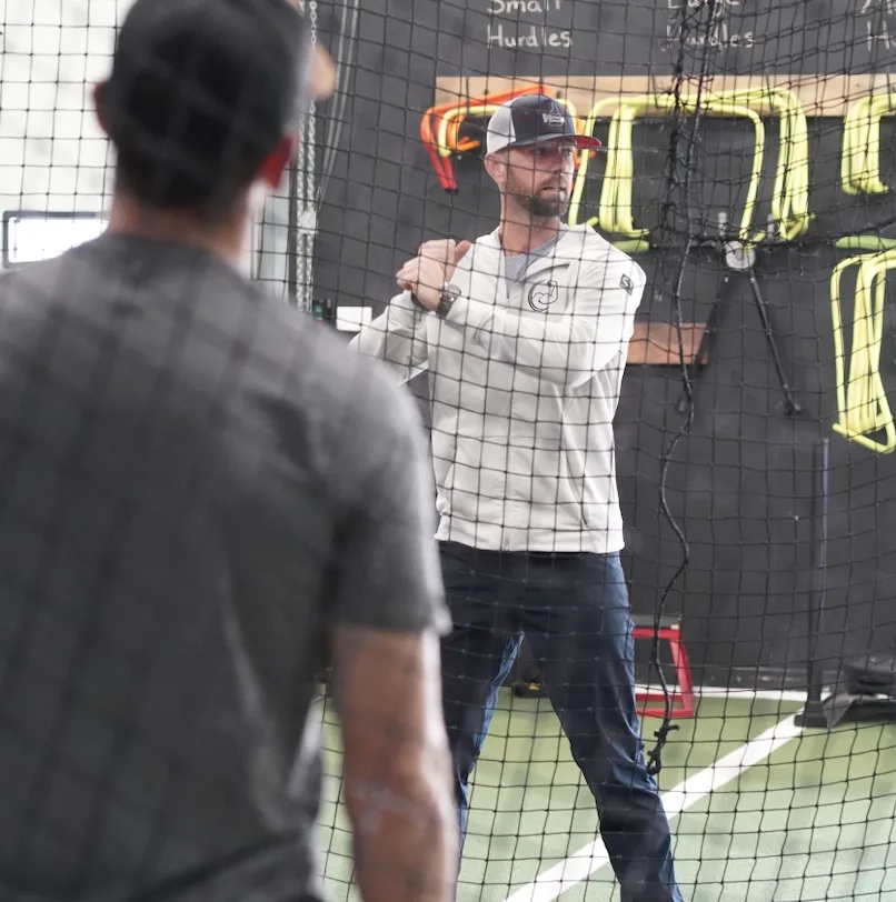 Mike Montville working with a professional athlete at Powerhouse